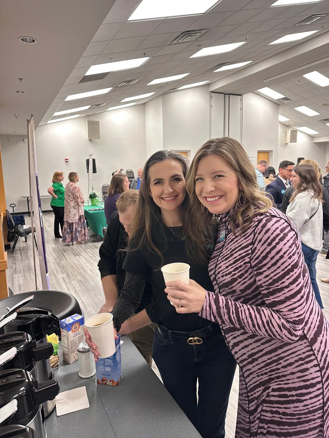 Guests enjoying coffee at the Catawba County Chamber Morning Brew networking event in Hickory, NC